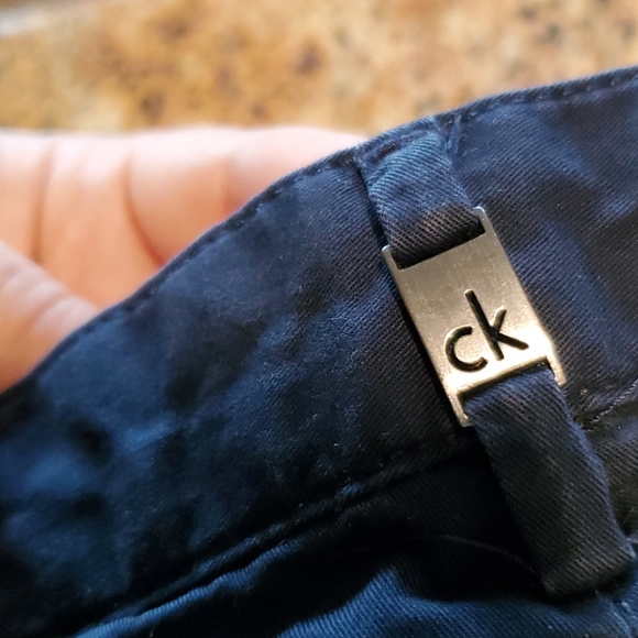 Calvin Klein Solid Straight Leg Chino Shorts - Picture 3 of 12